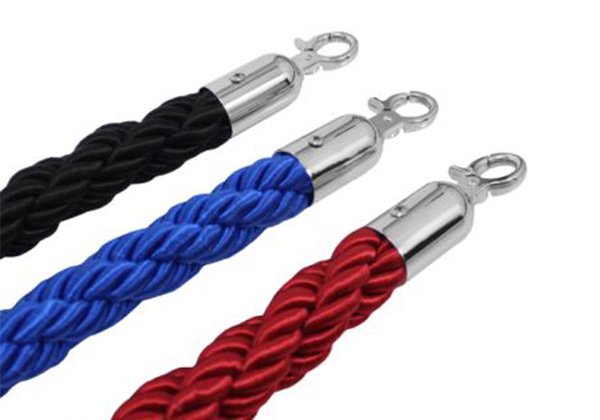 Closeup of twisted barrier ropes in red, blue or black