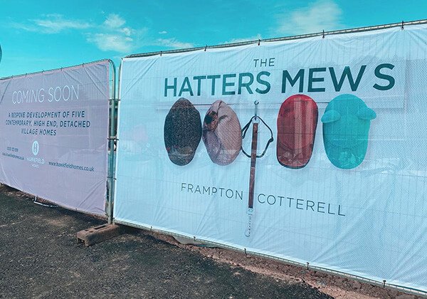 Printed Airmesh Heras Fence Covers on display at The Hatters Mews property construction site