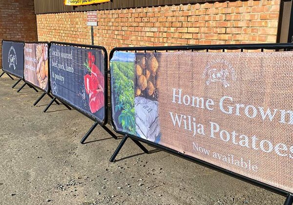 Image of 3 printed solo barrier covers on display at Spring Lane Farm Shop