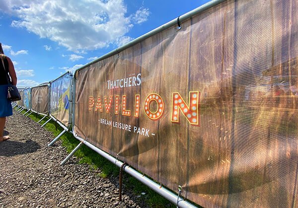 Closeup of Thatchers Pavilion solo crowd barrier cover at Brean Leisure Park