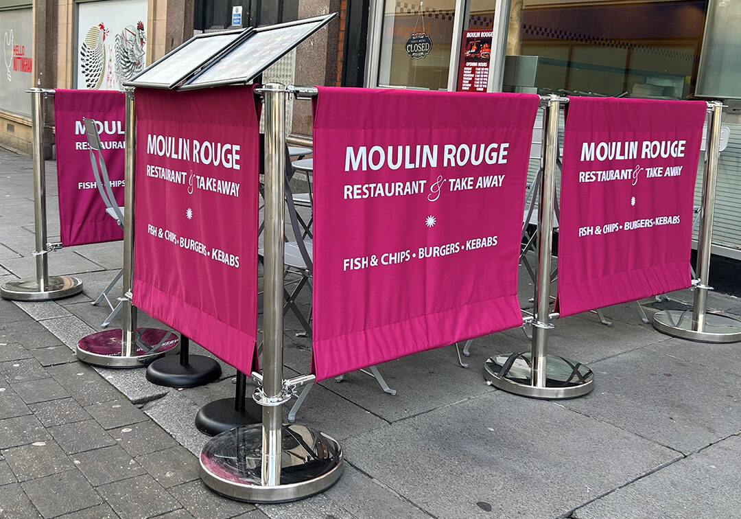 Image of cafe barrier banners for Moulin Rouge restaurant