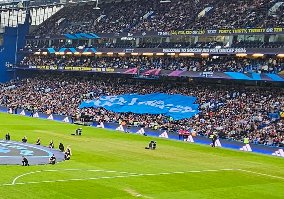 Image of crowd surf banner at Soccer Aid 2024