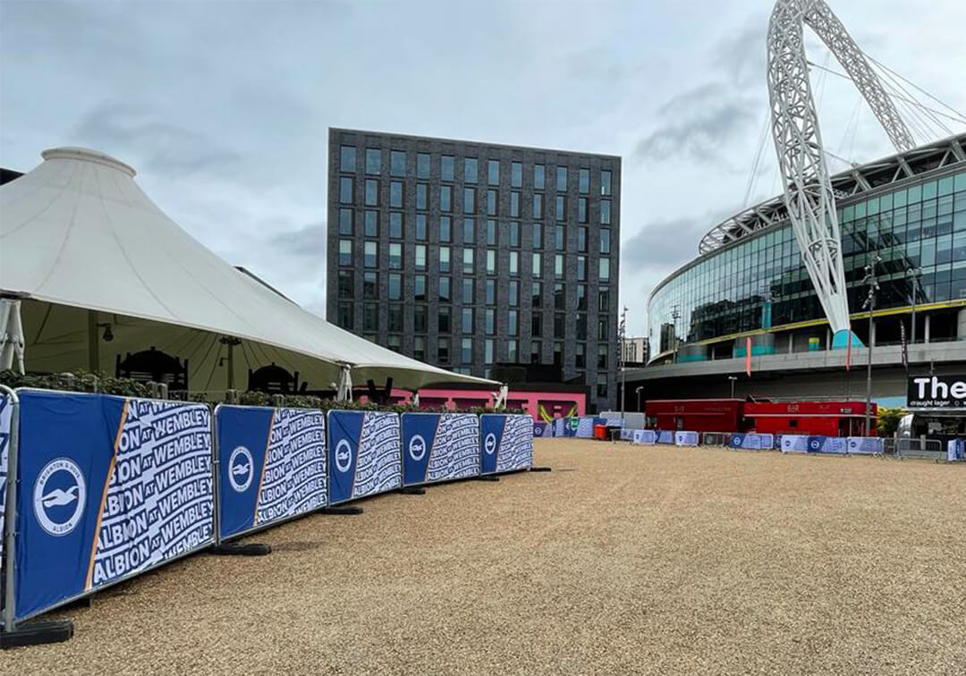 Brighton & Hove Albion Heras fence covers outside Wembley at the F.A Cup Semi Final