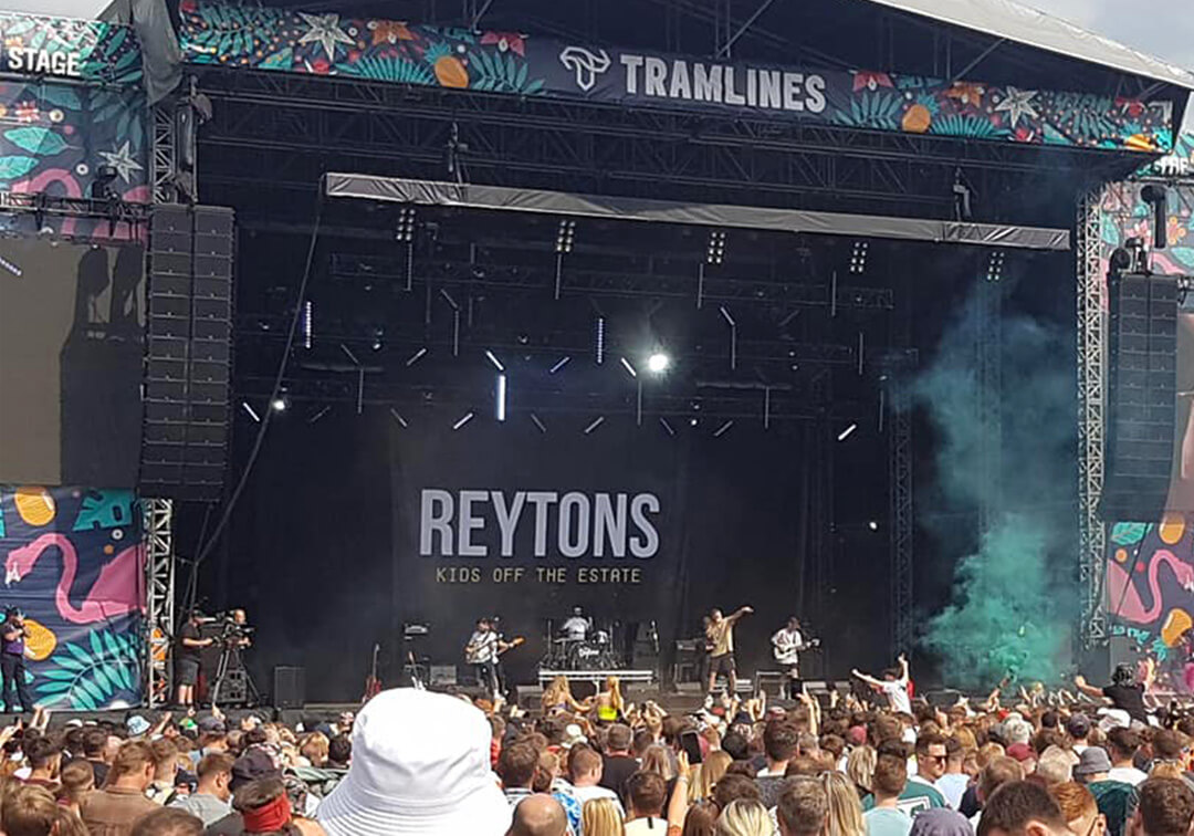 Stage backdrop on display for The Reytons performance at Tramlines Festival