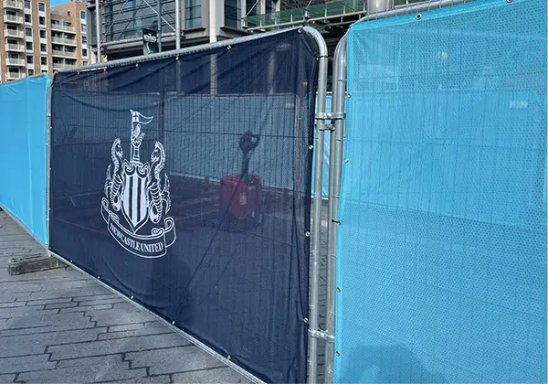 Heras Fence covers with Newcastle United FC branding