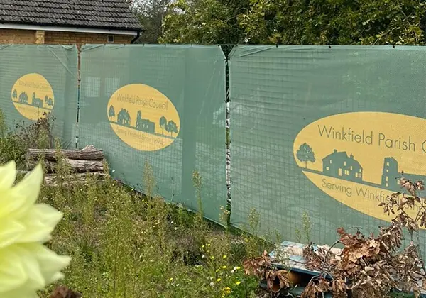 Heras fence covers with Winkfield Parish Council branding