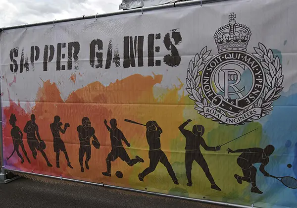 Heras fence cover with Sapper Games branding