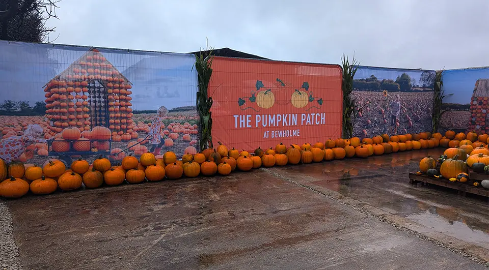 Elite Heras fence covers with branding for The Pumpkin Patch event