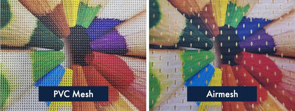 Best Crowd Barrier Covers for Your Budget 5 A side-by-side close-up comparison of PVC Mesh and Airmesh materials printed with a colorful pencil design. The PVC mesh has a solid, perforated texture, while the Airmesh has a woven, fabric-like appearance with visible air holes.